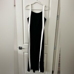 Super cute NEVER WORN Romper! Size L (fits more like a M imo) Black & White.